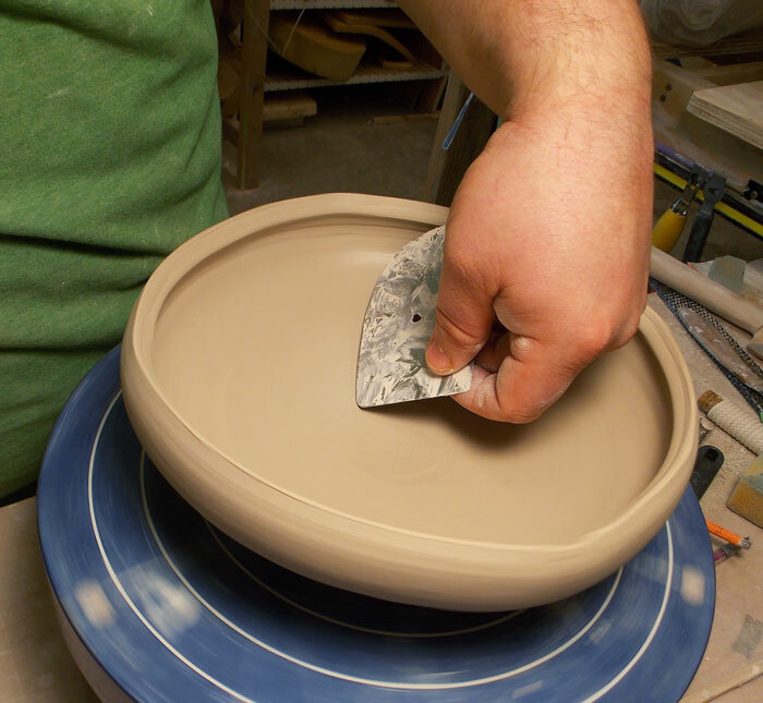 Bill Wilkey using the Stainless Steel Rib #2 to refine his bowl form.
